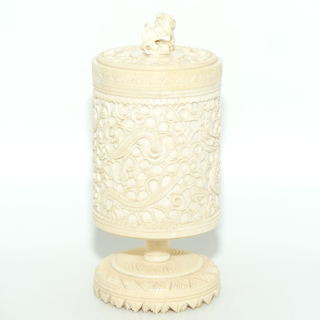 Elaborately carved Ivory lidded pot | Lion finial | Continuous Dragon