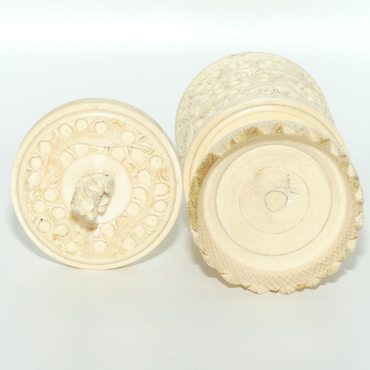 Elaborately carved Ivory lidded pot | Lion finial | Continuous Dragon