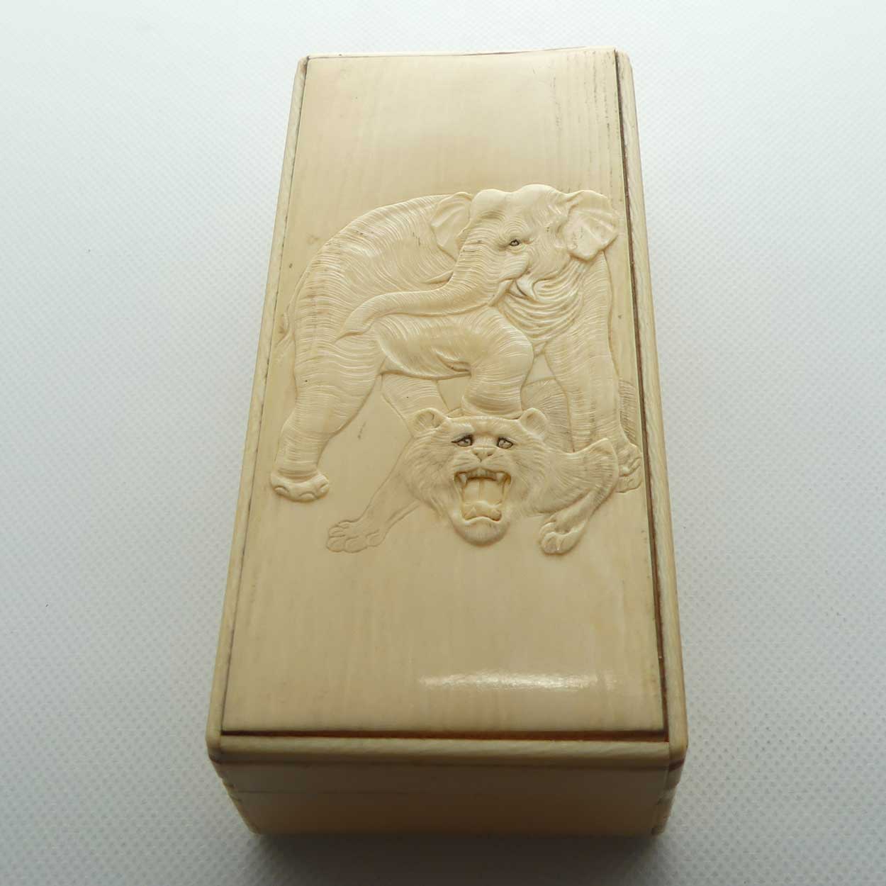Carved Ivory trinket box depicting Elephant and Tiger