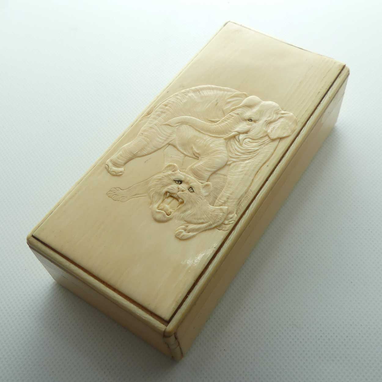 Carved Ivory trinket box depicting Elephant and Tiger