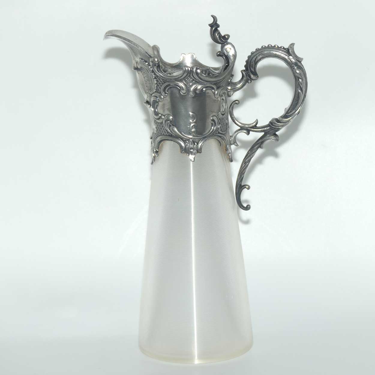 Late Victorian Brittania metal mounted threaded glass claret jug