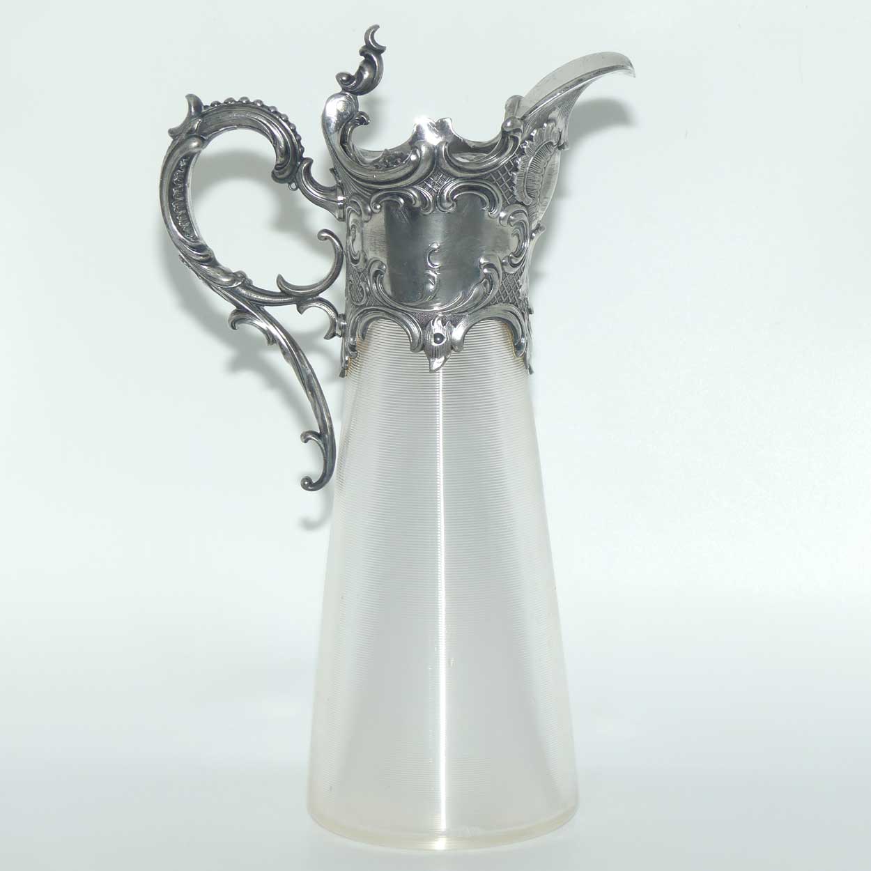 Late Victorian Brittania metal mounted threaded glass claret jug