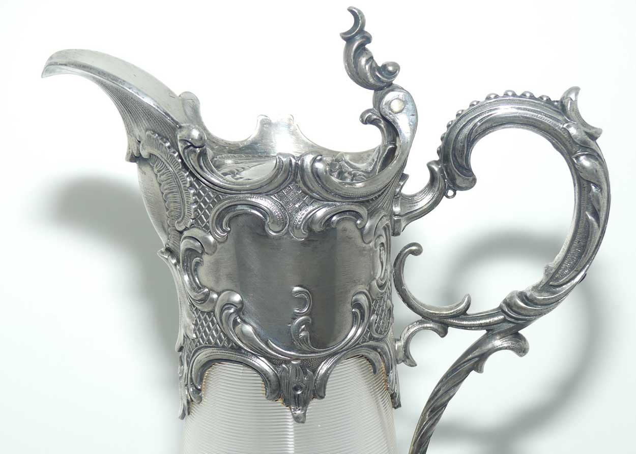 Late Victorian Brittania metal mounted threaded glass claret jug