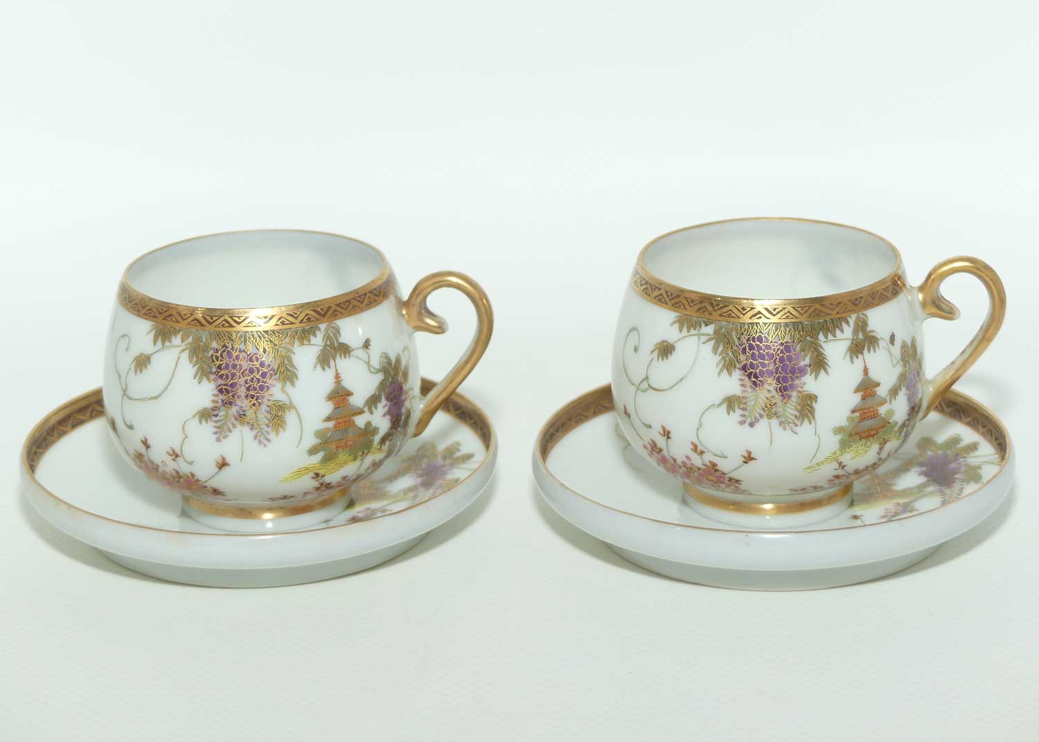 Japanese Eggshell China pair of duos decorated with Pagoda and Wisteria