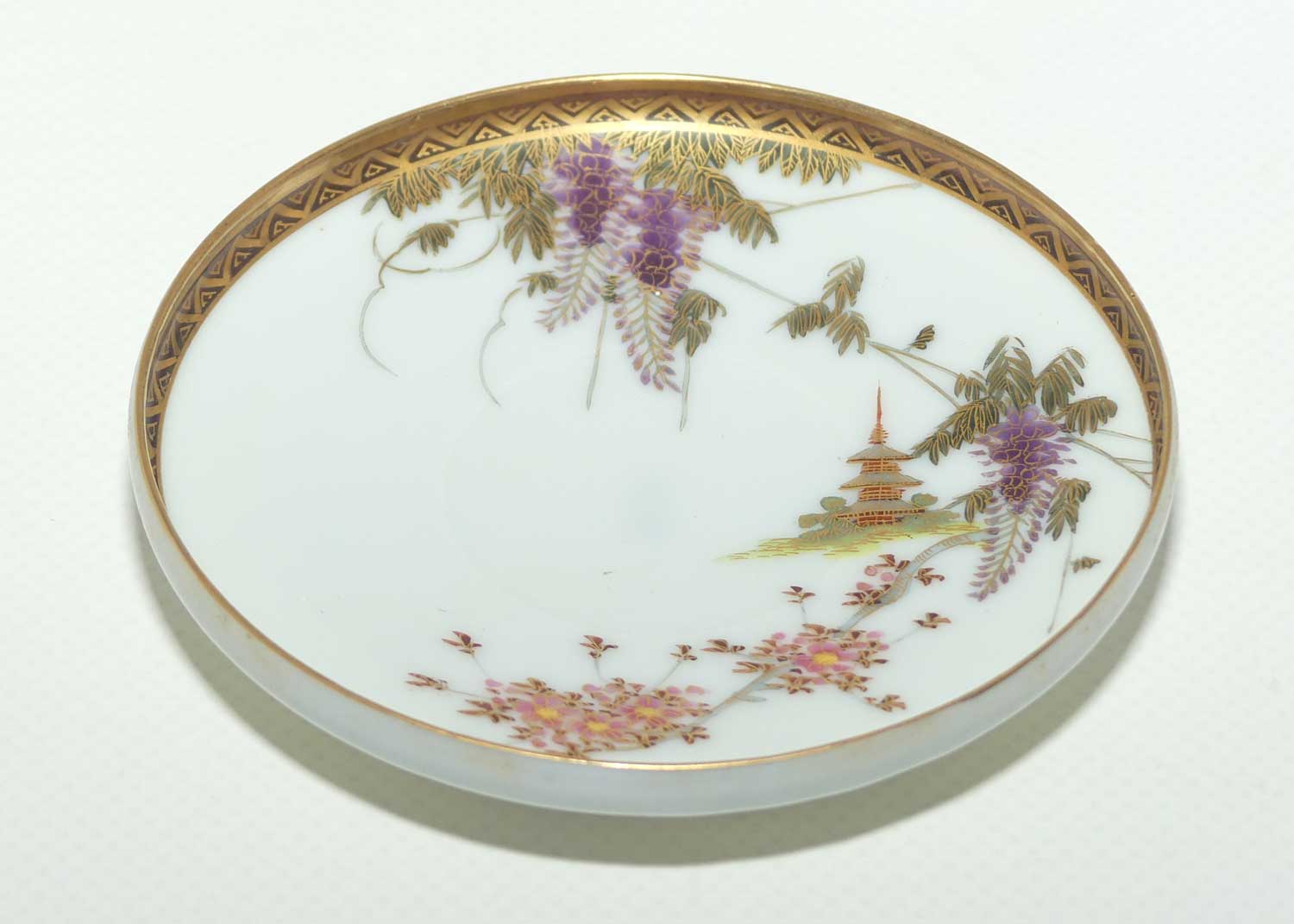Japanese Eggshell China pair of duos decorated with Pagoda and Wisteria