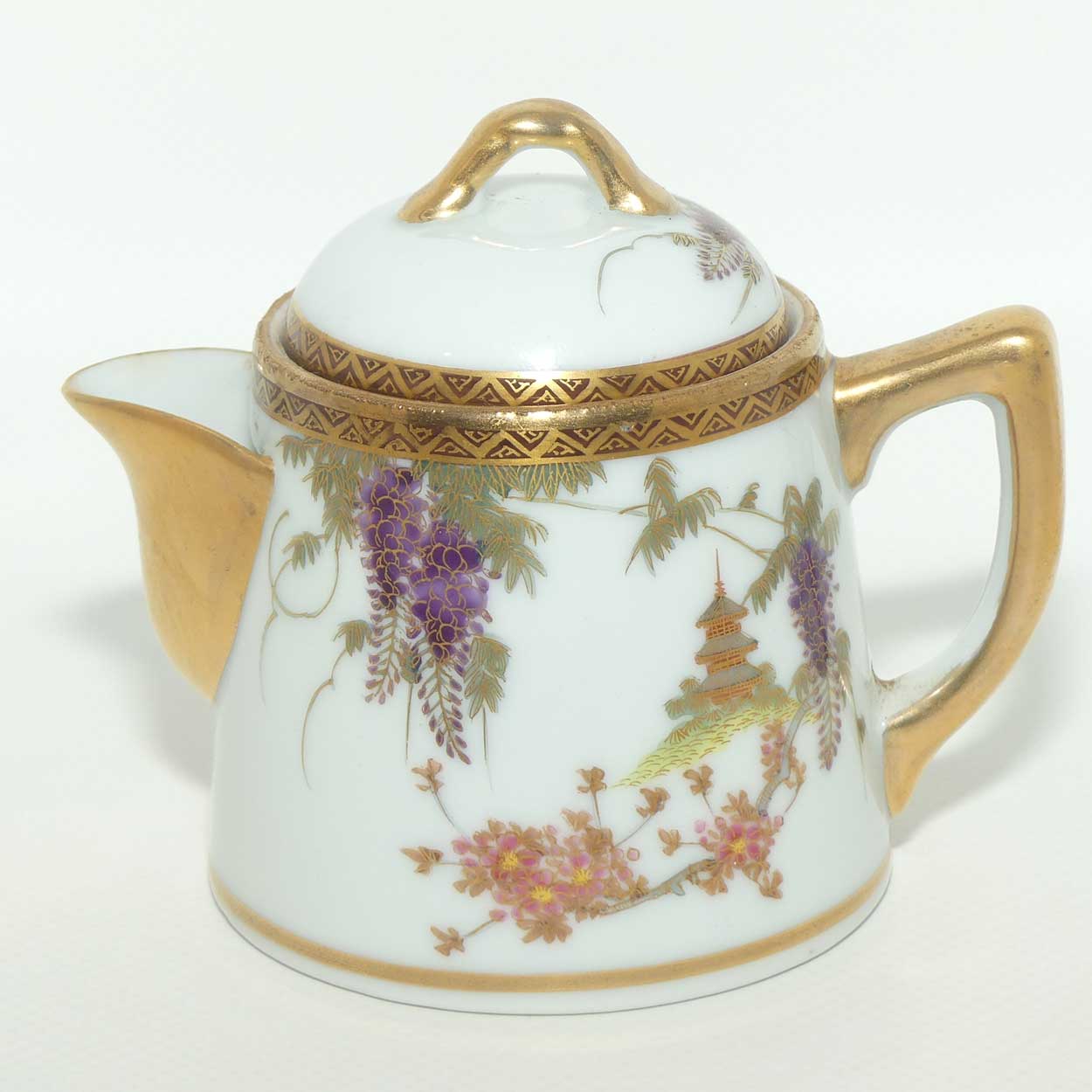 Japanese Eggshell China milk jug decorated with Pagoda and Wisteria