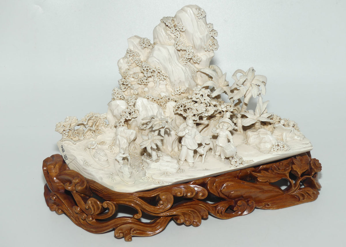 Magnificent Chinese Carved Ivory complex figure of Fishing Village on ornate wooden display stand