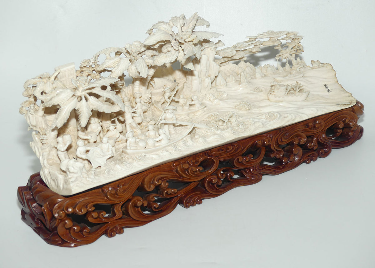 Magnificent Chinese Carved Ivory complex figure of Fishing Village on ornate wooden display stand | 42cm long