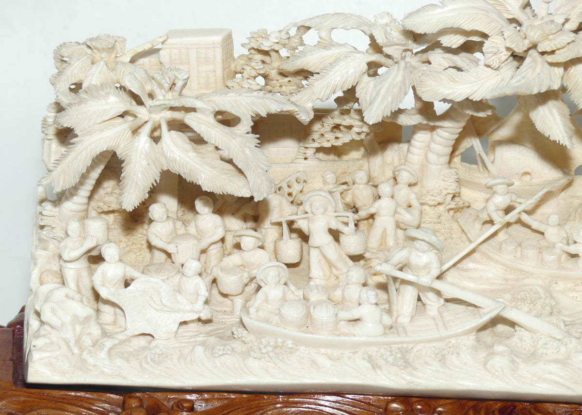 Magnificent Chinese Carved Ivory complex figure of Fishing Village on ornate wooden display stand | 42cm long