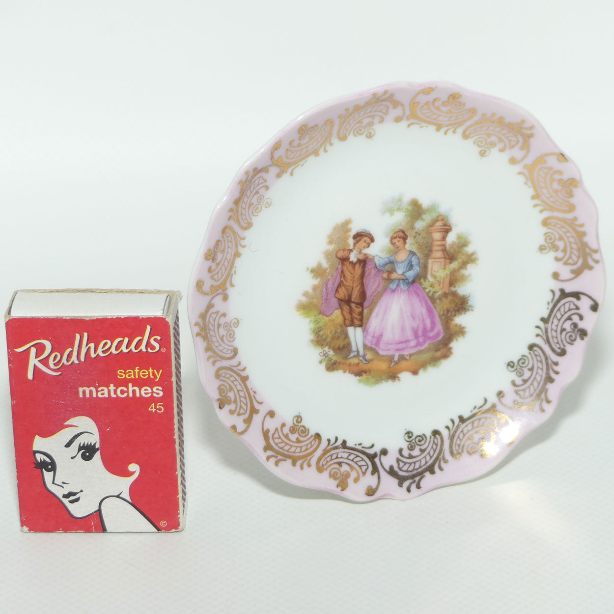 Limoges France Pink and Gilt border Courting Scene plate | 9.7cm wide