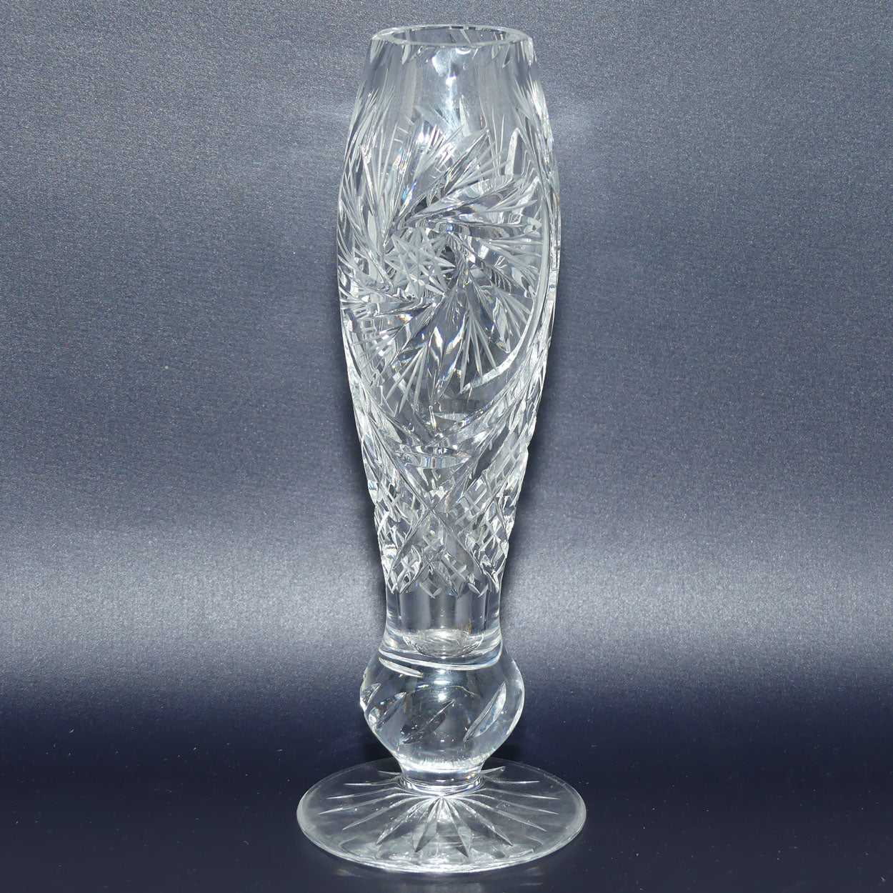 Heavy Crystal slender shape bud vase with pinwheel decoration