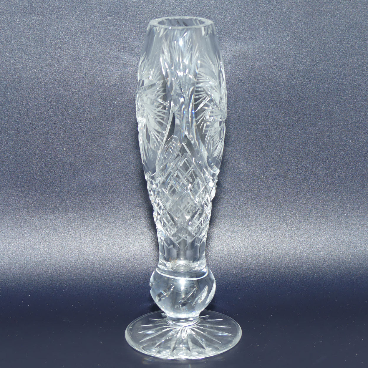 Heavy Crystal slender shape bud vase with pinwheel decoration
