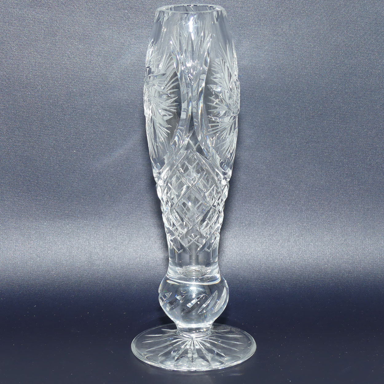 Heavy Crystal slender shape bud vase with pinwheel decoration