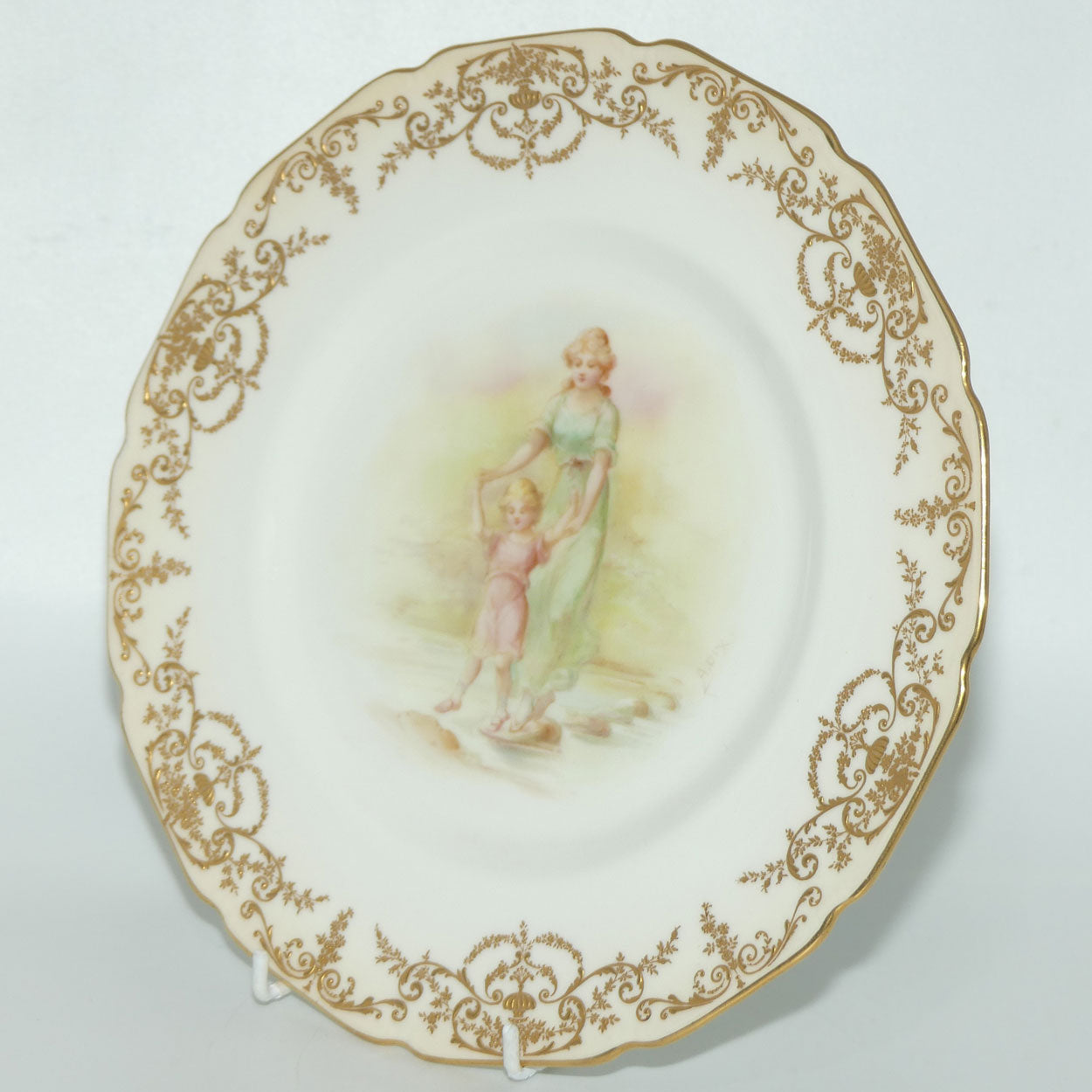 Royal Doulton hand painted and gilt Young woman and Child walking over stepping stones plate (Dix)