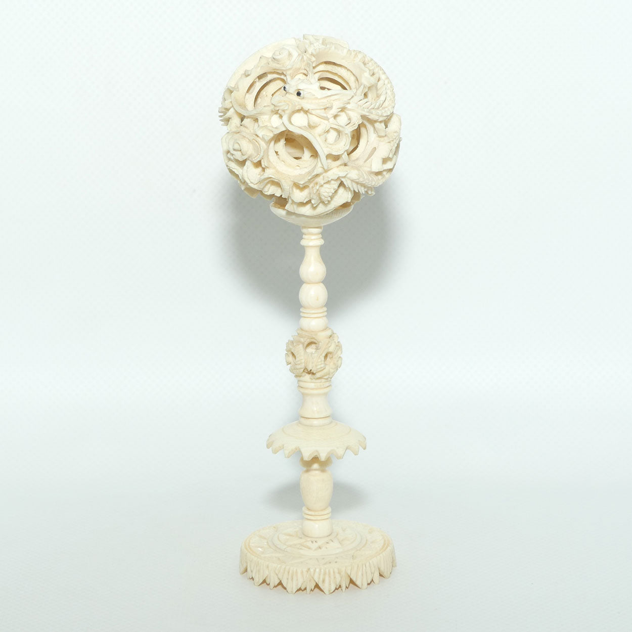 Carved Ivory Puzzle Ball on stand | Dragon with Black Eyes | 16.5cm tall