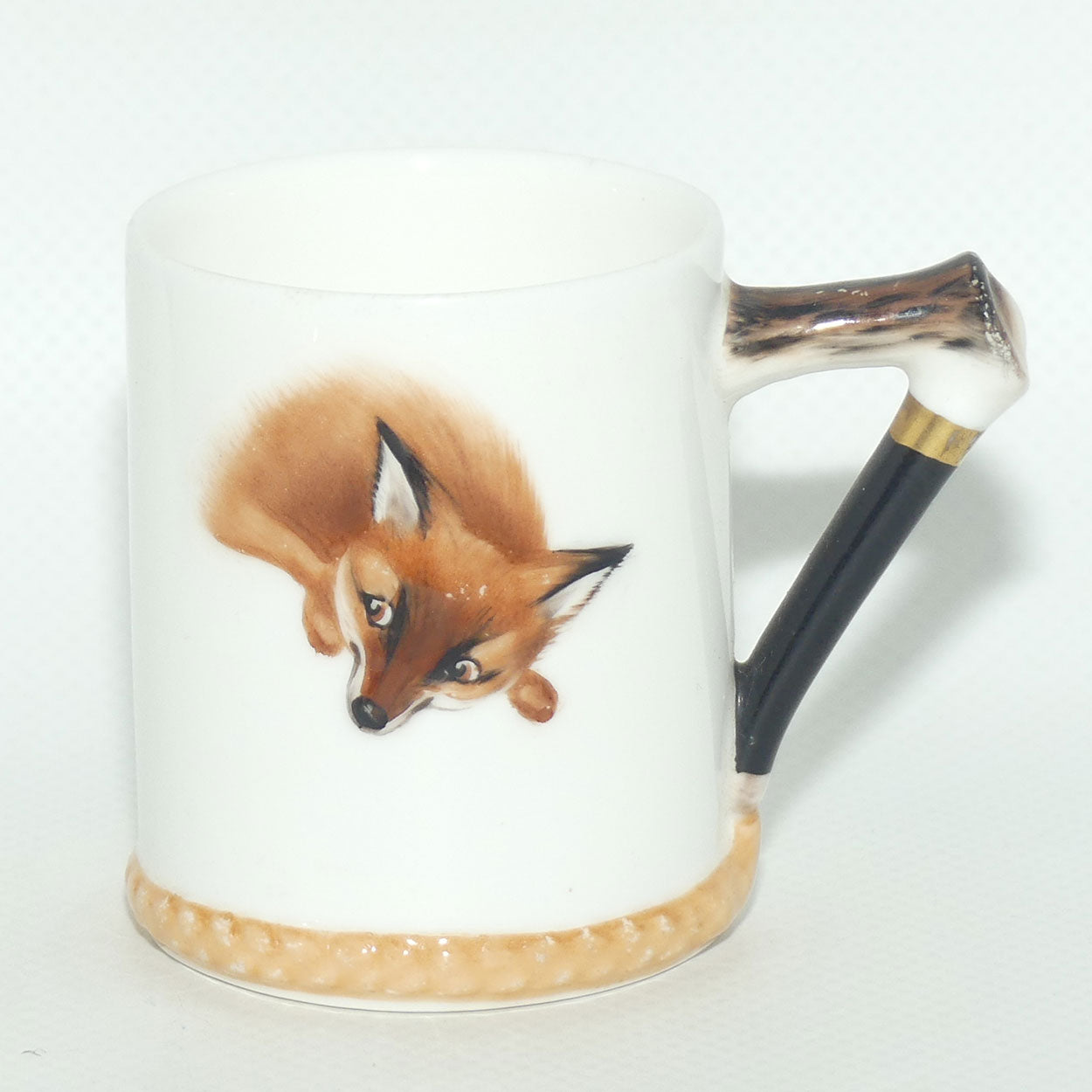 Royal Doulton Reynard the Fox coffee cup and saucer H4927 | Fox Lying | Handpainted H4927