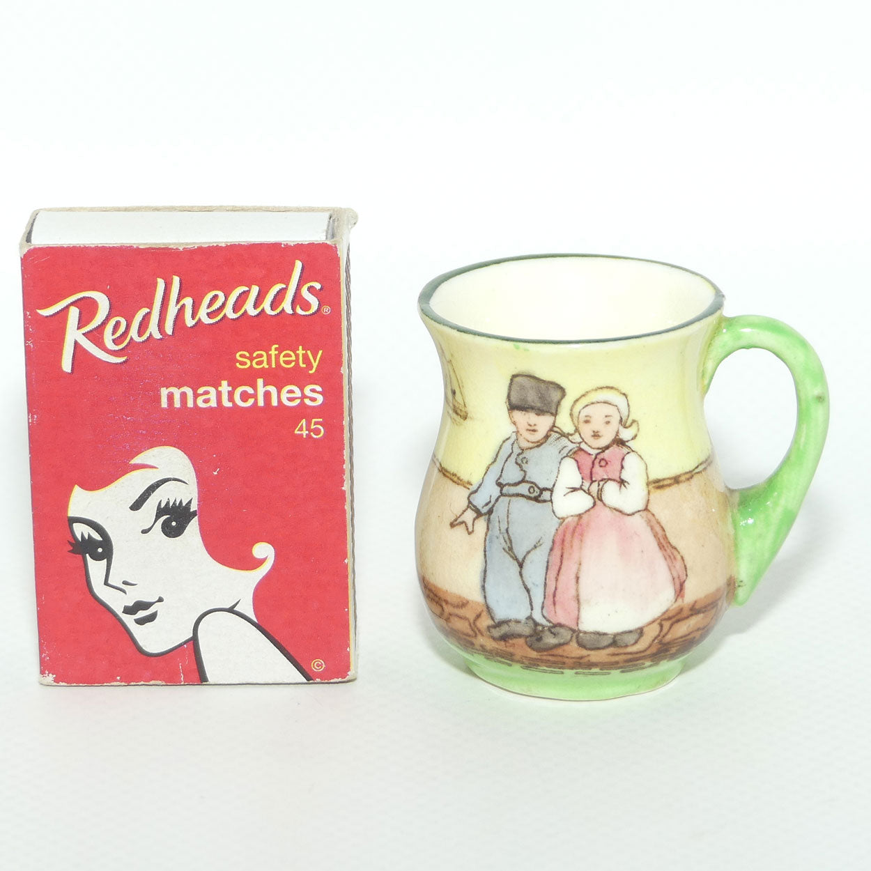 Royal Doulton Dutch A Harlem pattern miniature mug | Young Boy and Girl
