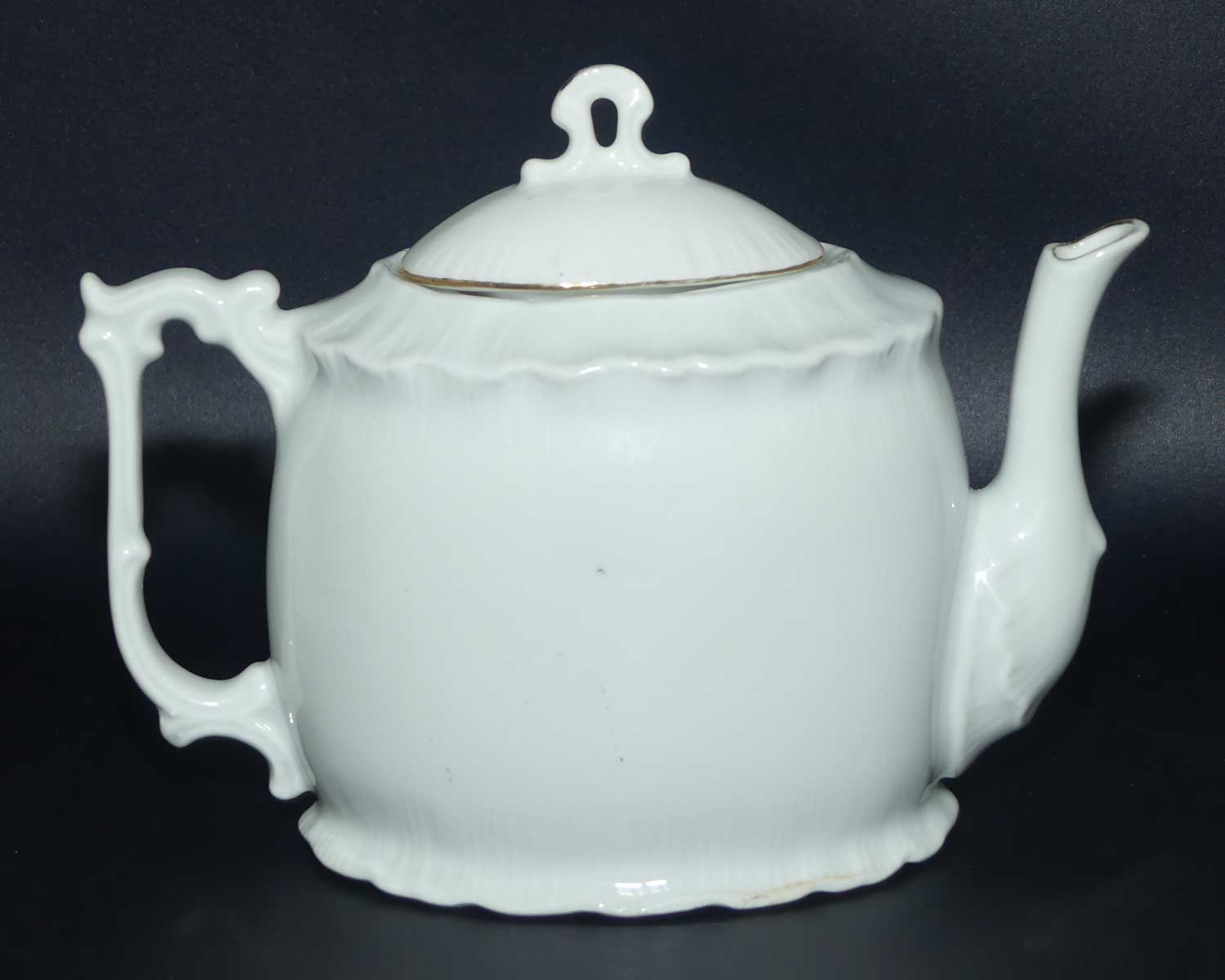 Souvenir tea pot | Depicts Crest of Eastbourne Meliora Sequimir c.1905