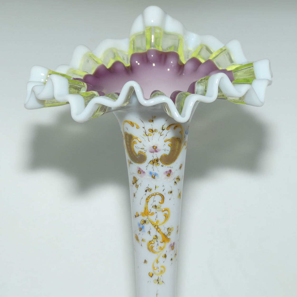 Victorian era Milk and Mulberry Glass, Hand enamelled single trumpet epergne with Uranium Glass trim