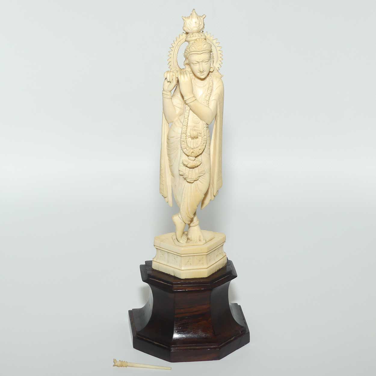 Carved Ivory figure of Hindi Deity Lord Krishna playing a Flute