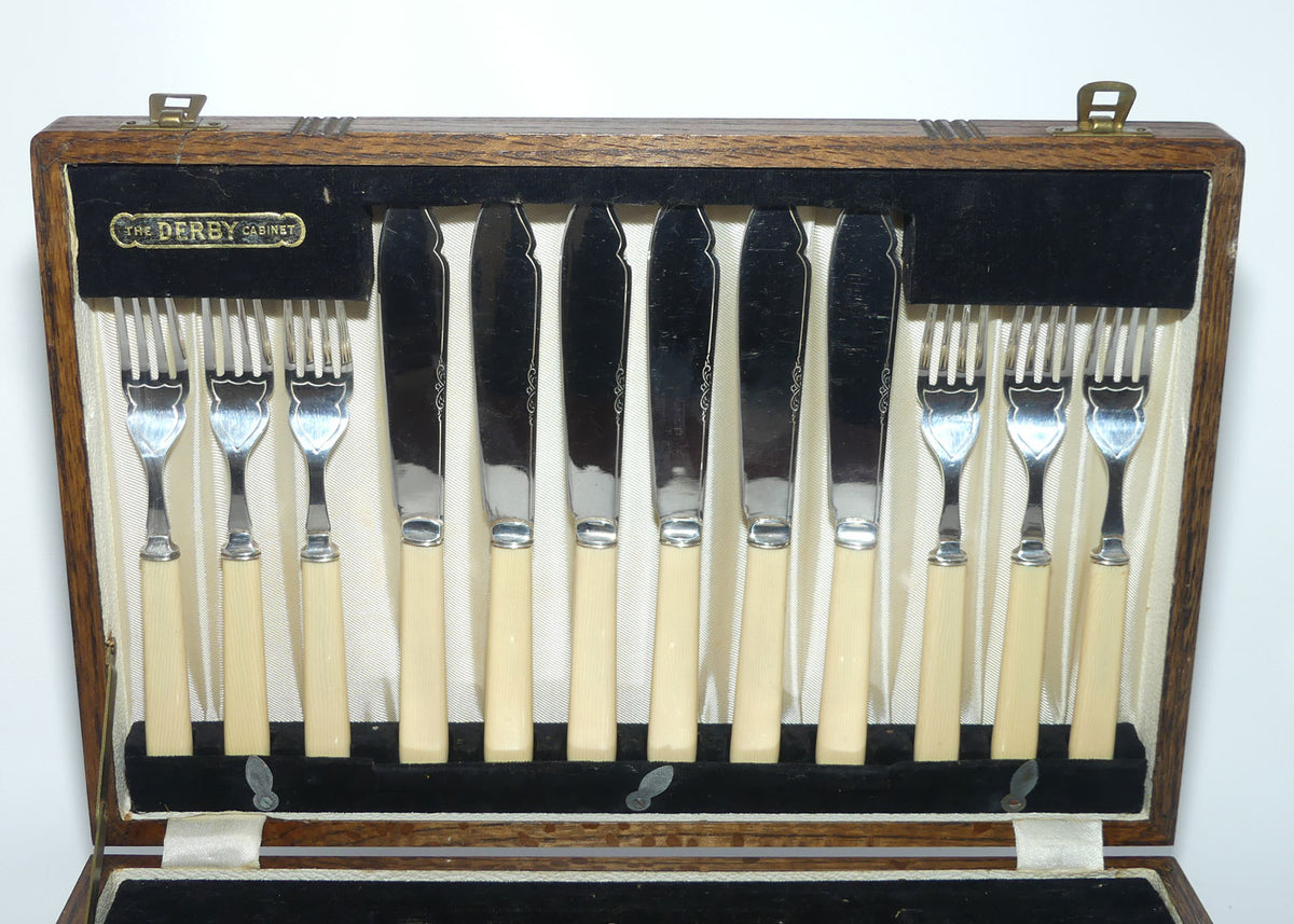 Edwardian era Bone handled and EPNS blades set of 12 fish eaters in Oak canteen