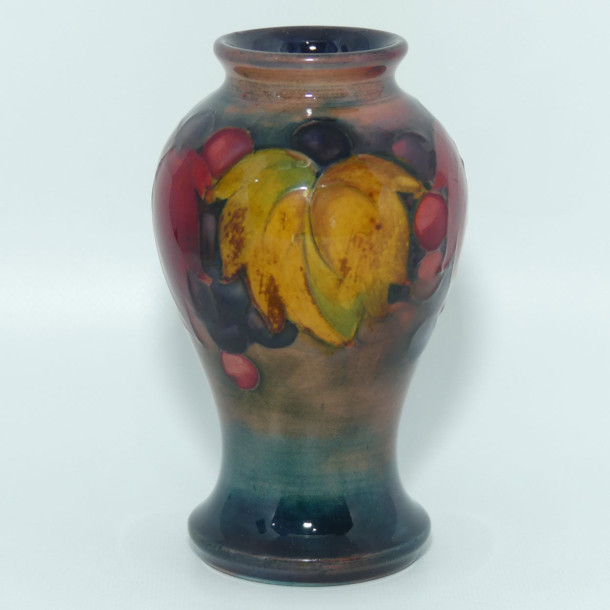 William Moorcroft Flambe Leaves and Fruit miniature vase