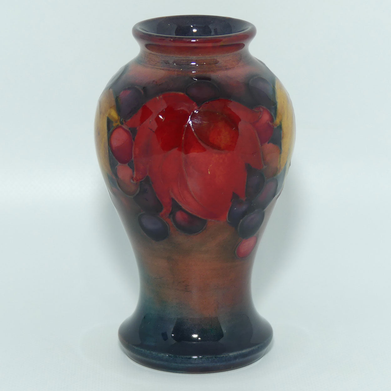William Moorcroft Flambe Leaves and Fruit miniature vase
