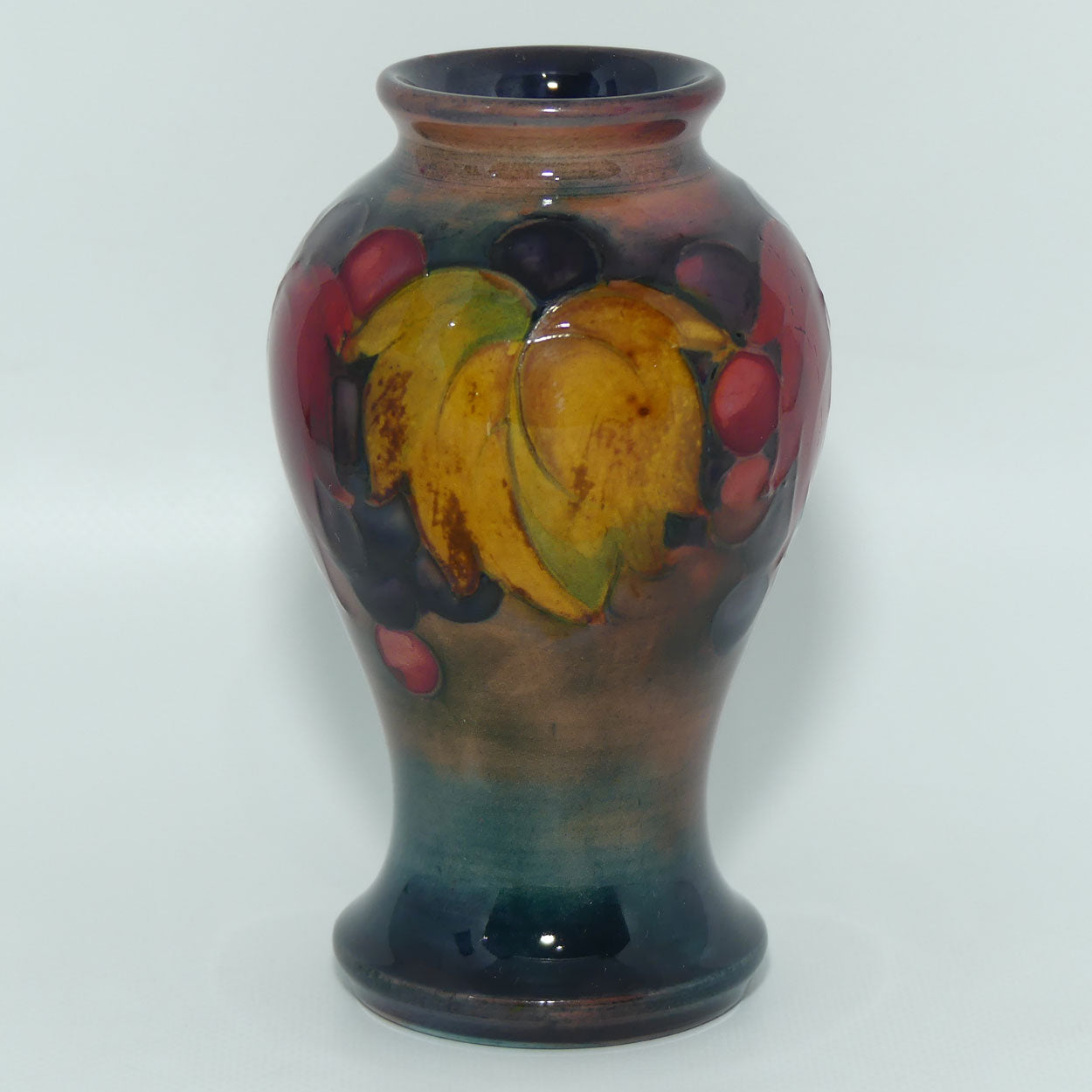 William Moorcroft Flambe Leaves and Fruit miniature vase