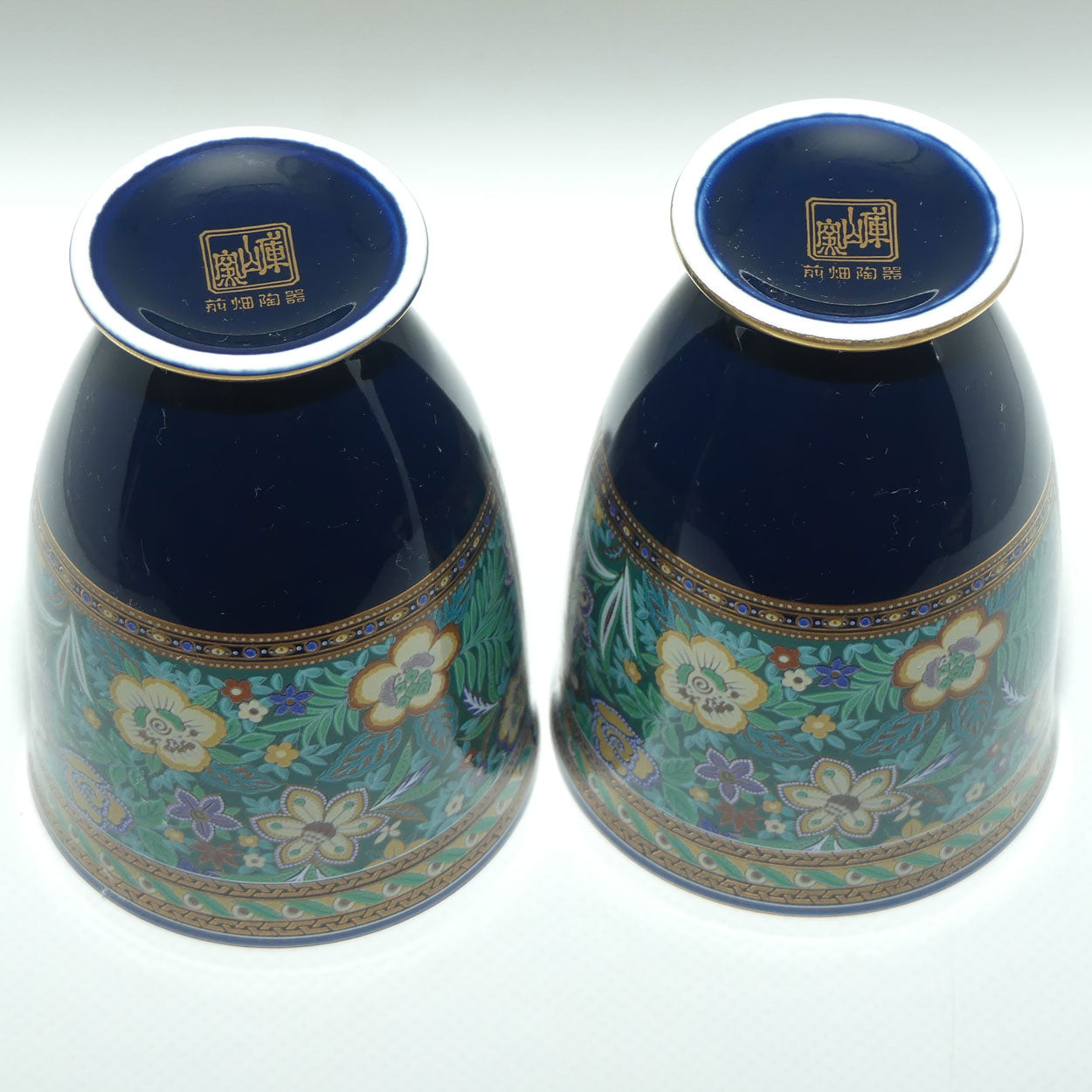 Pair of Japanese Tea Beakers with elaborate Floral decor