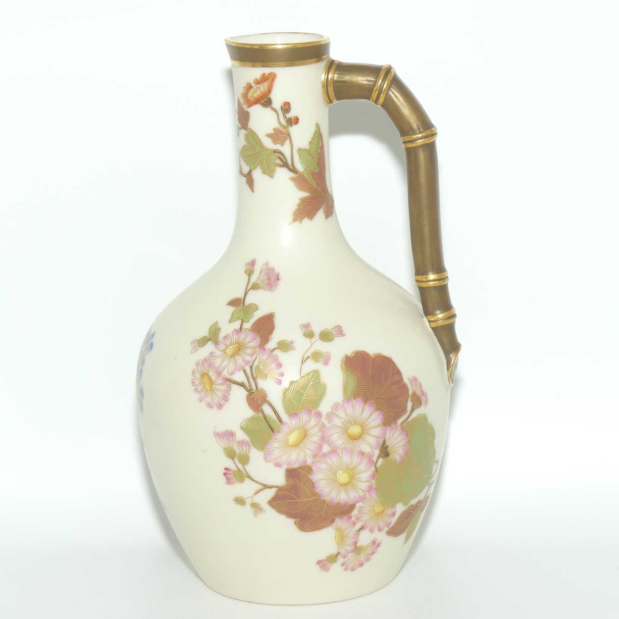 Royal Worcester Blush Ivory and gilt hand painted floral jug with bamboo style handle