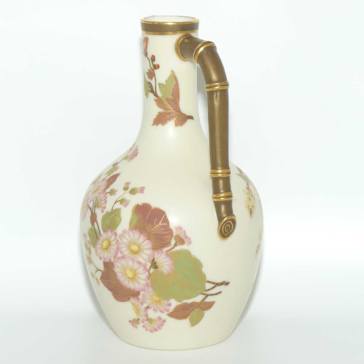 Royal Worcester Blush Ivory and gilt hand painted floral jug with bamboo style handle