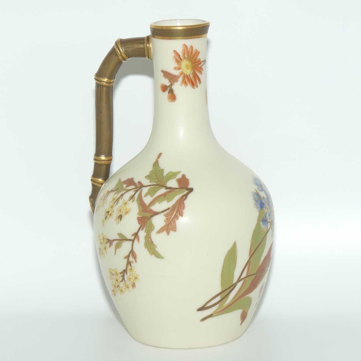 Royal Worcester Blush Ivory and gilt hand painted floral jug with bamboo style handle