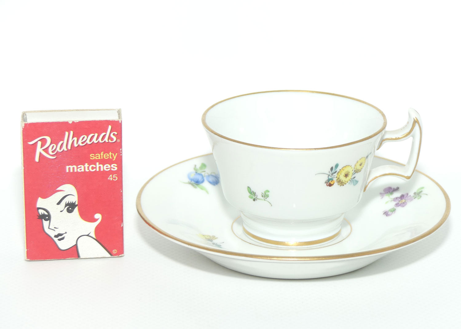 Meissen Hand decorated small demi tasse cup and saucer