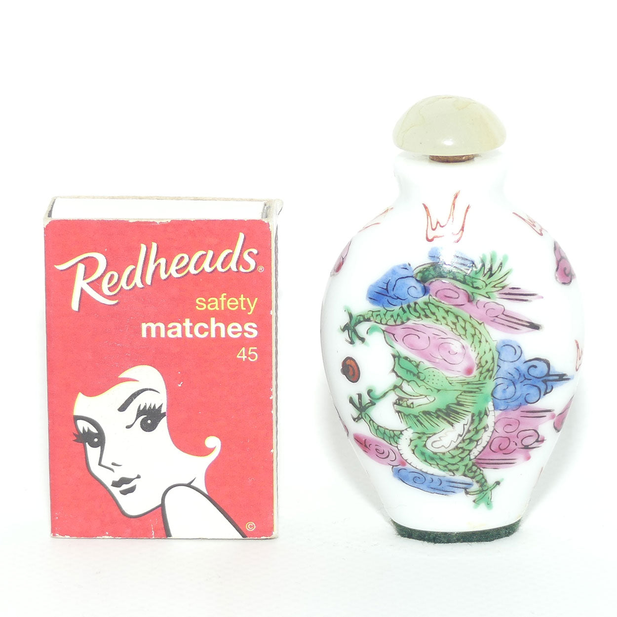 Chinese snuff bottle with greenstone stopper | Dragon motif