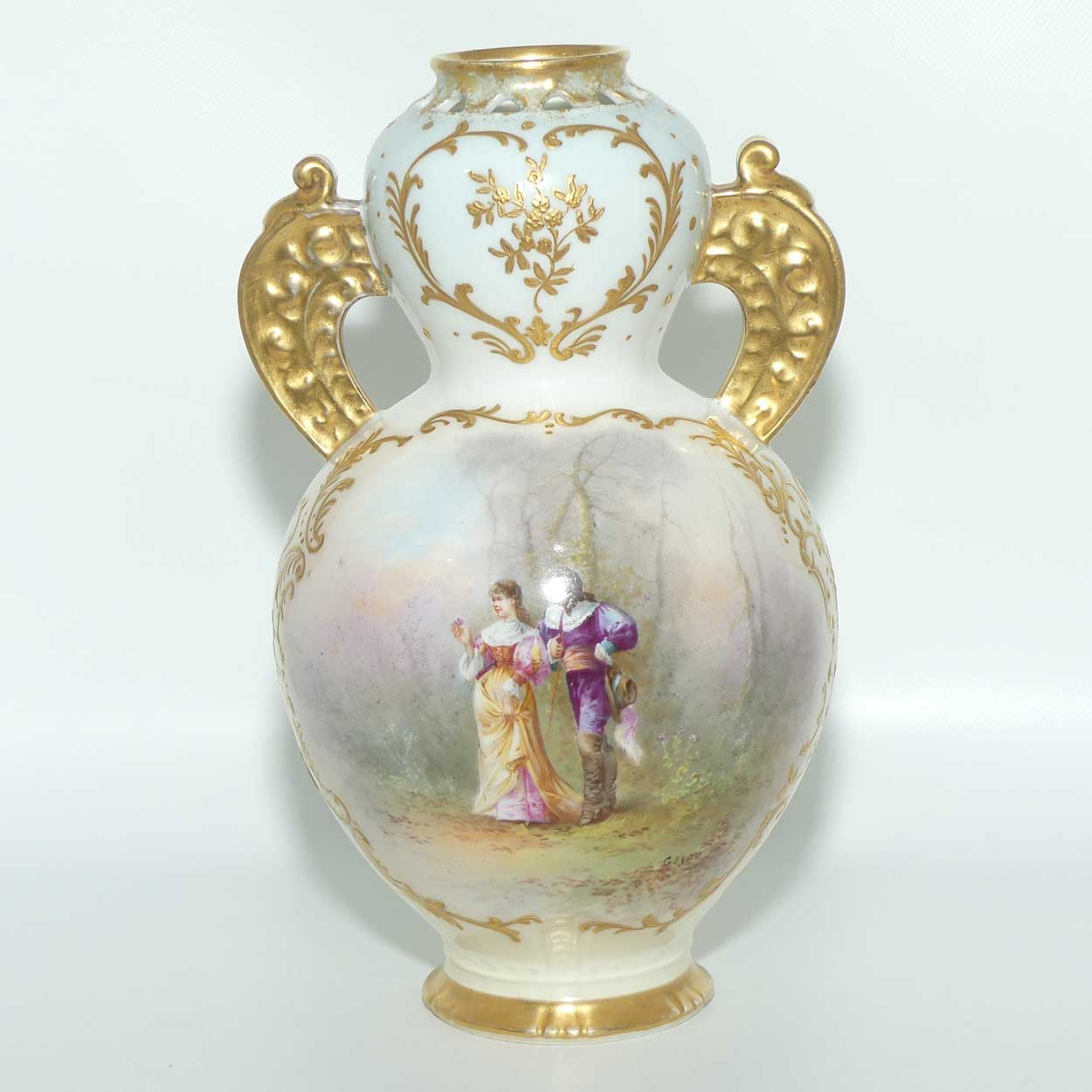 Late 19th Century French Sevres style waisted vase with reticulated rim and gilt handles