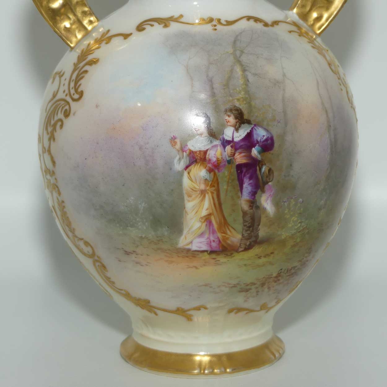 Late 19th Century French Sevres style waisted vase with reticulated rim and gilt handles