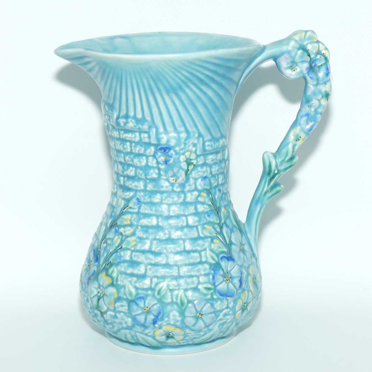Arthur Woods Garden Wall floral embossed jug | Matt blue Glaze