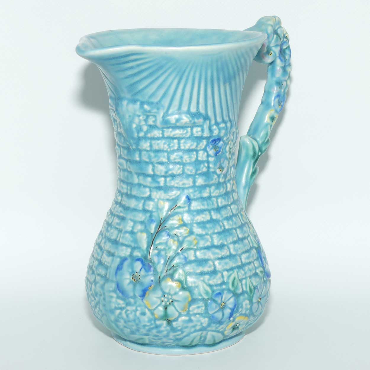 Arthur Woods Garden Wall floral embossed jug | Matt blue Glaze
