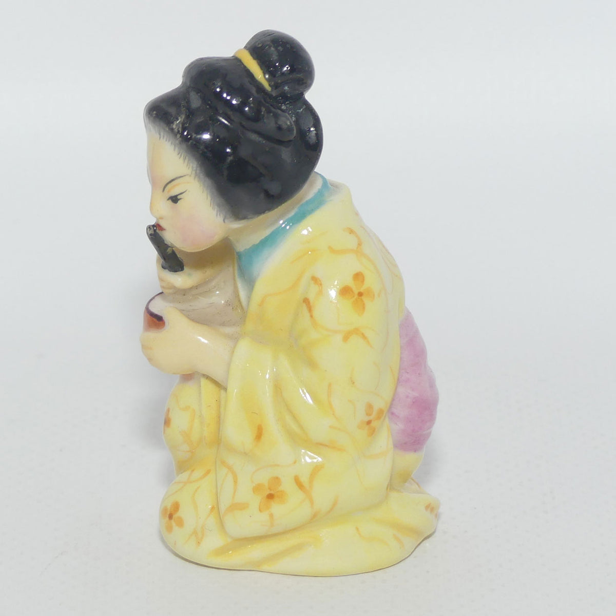 Royal Worcester figural Geisha Girl | Japanese Girl candle snuffer | Puce mark | c.1909