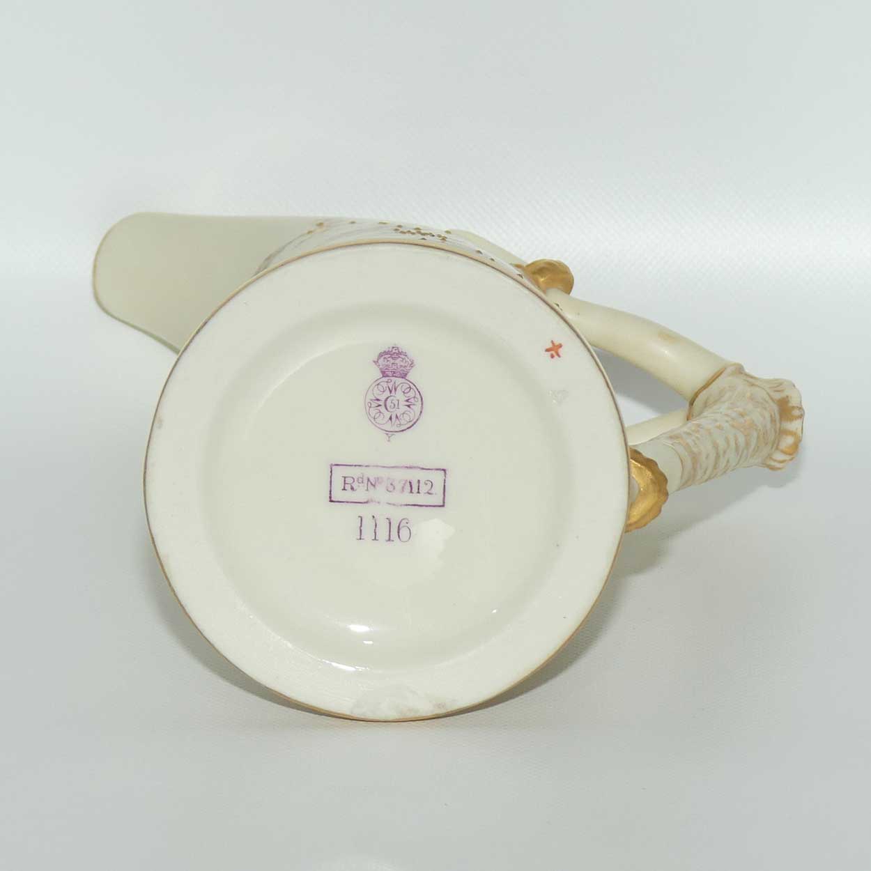 Royal Worcester Blush Ivory hand painted and gilt horn handle jug
