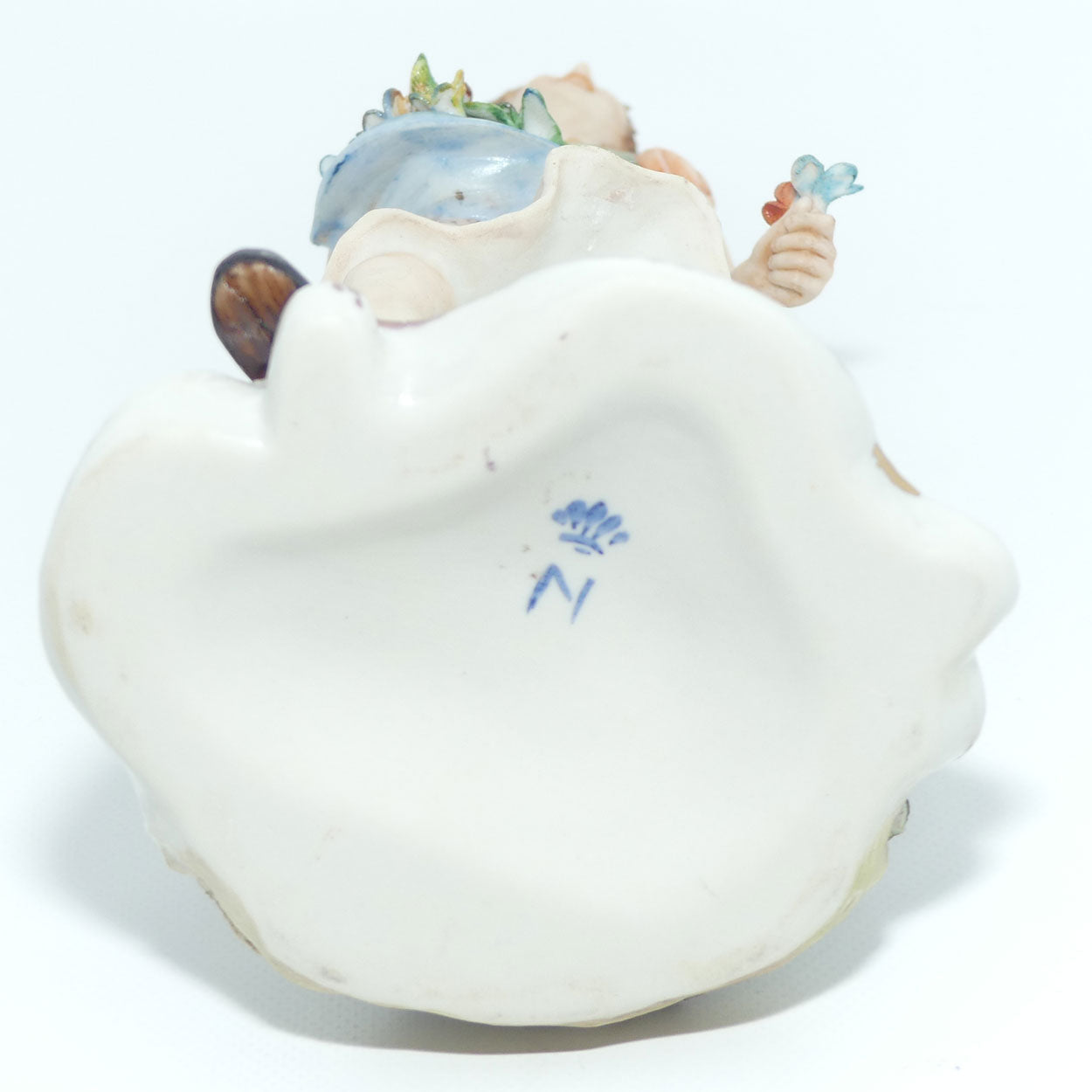 Capodimonte figure signed Sandro | Girl with Flowers