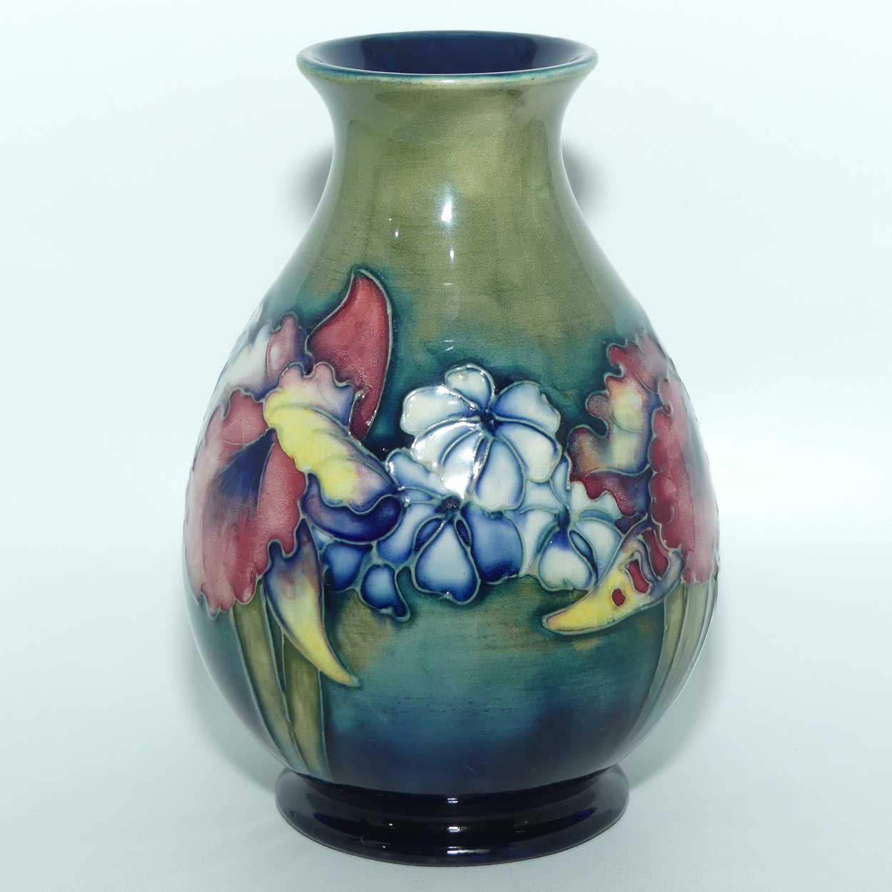 Walter Moorcroft Orchid on Light Green transition to Blue Ground vase | Shape 7