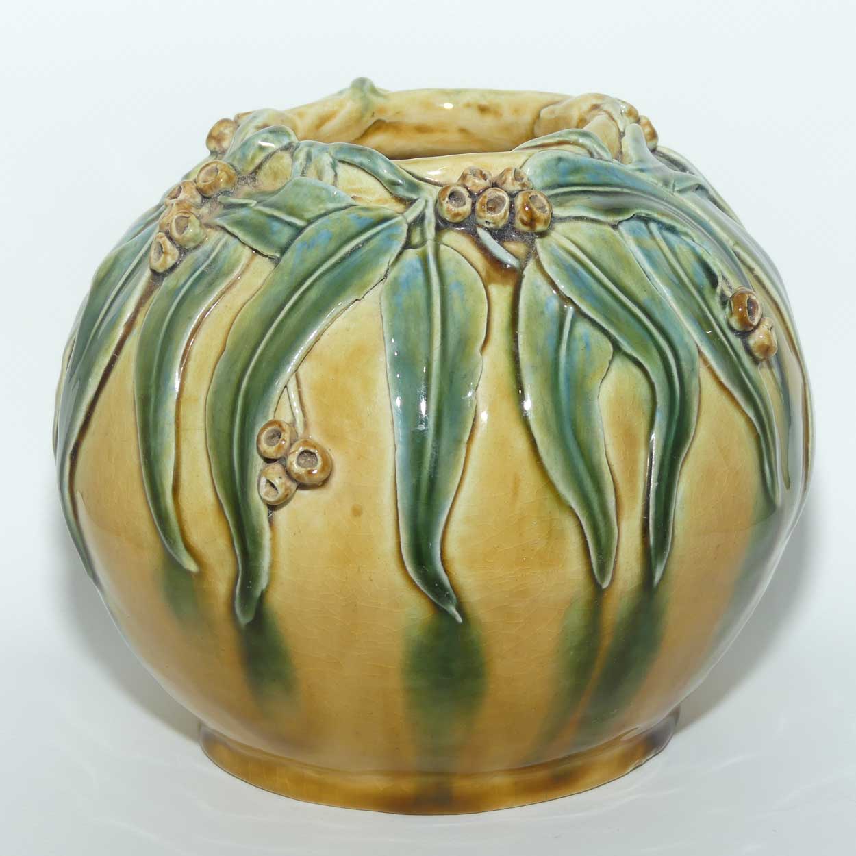 Australian Pottery | Hand Built Gum Nuts and Gum leaves ball vase signed R.W.