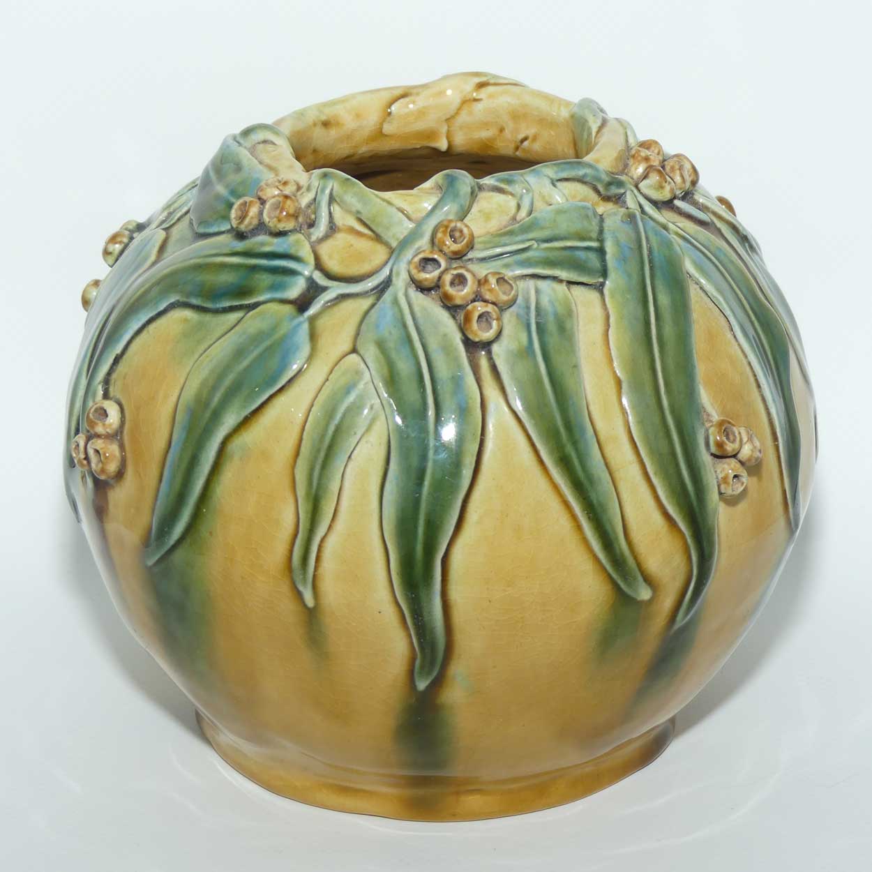 Australian Pottery | Hand Built Gum Nuts and Gum leaves ball vase signed R.W.