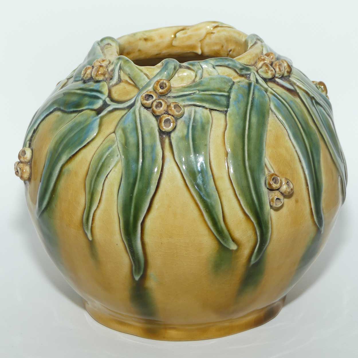 Australian Pottery | Hand Built Gum Nuts and Gum leaves ball vase signed R.W.