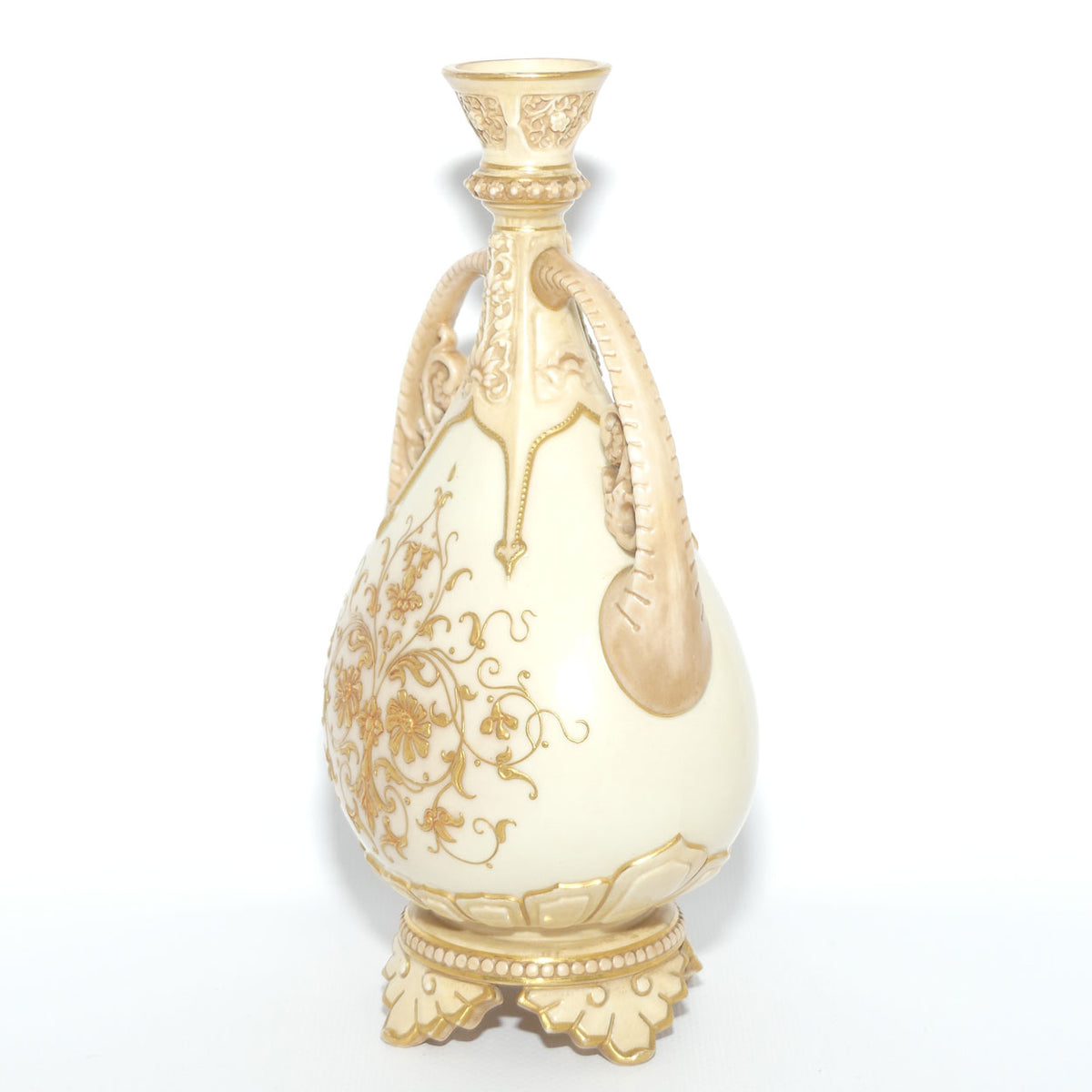 Royal Worcester Blush Ivory heavily gilt handled vase on quad feet