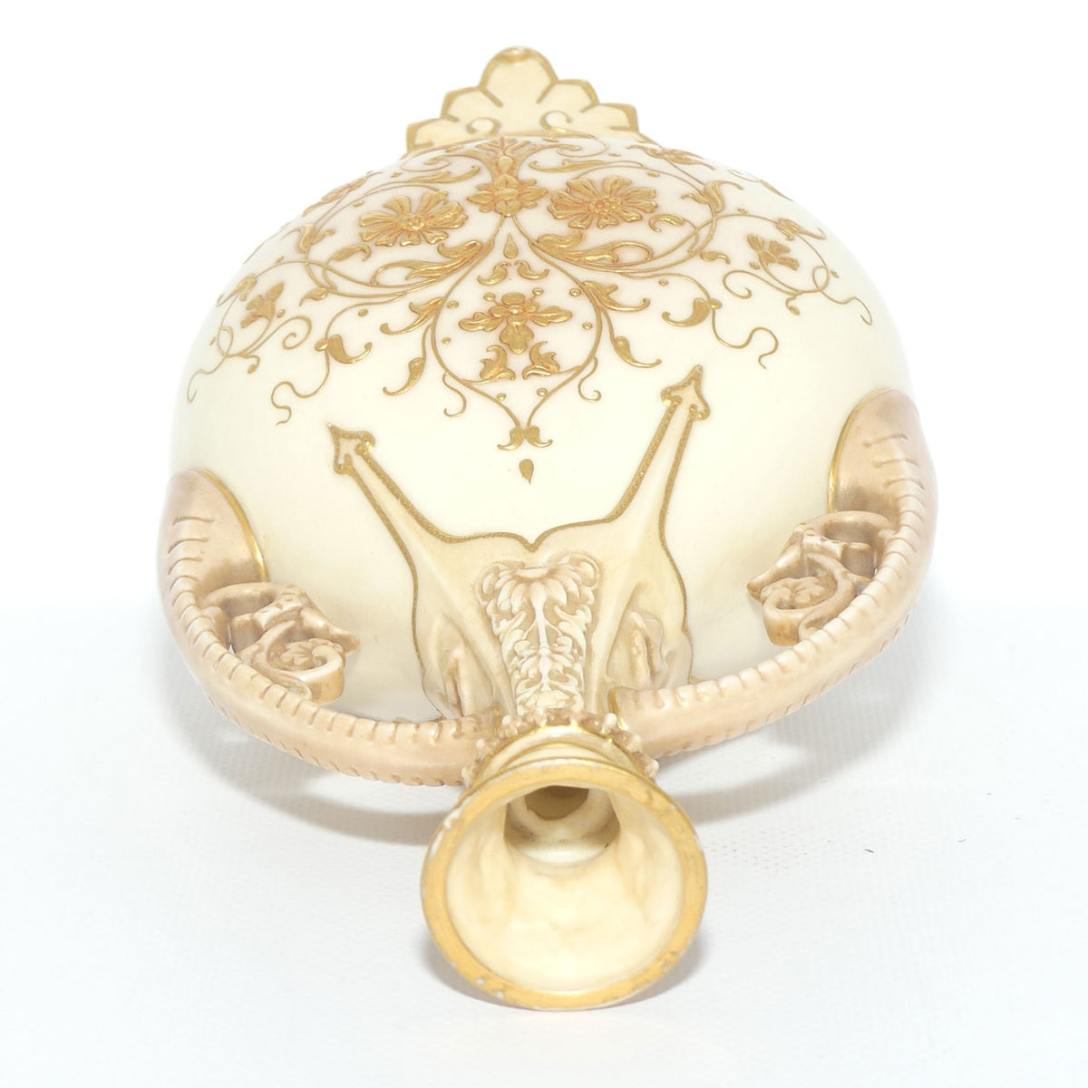 Royal Worcester Blush Ivory heavily gilt handled vase on quad feet