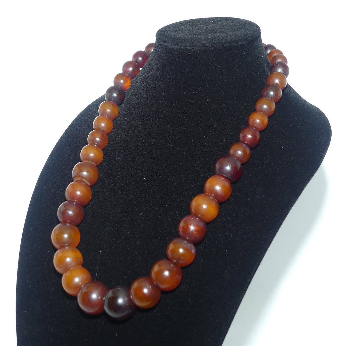 Very Heavy Antique set of Cognac Amber beads - strung on cord | 70cm total length