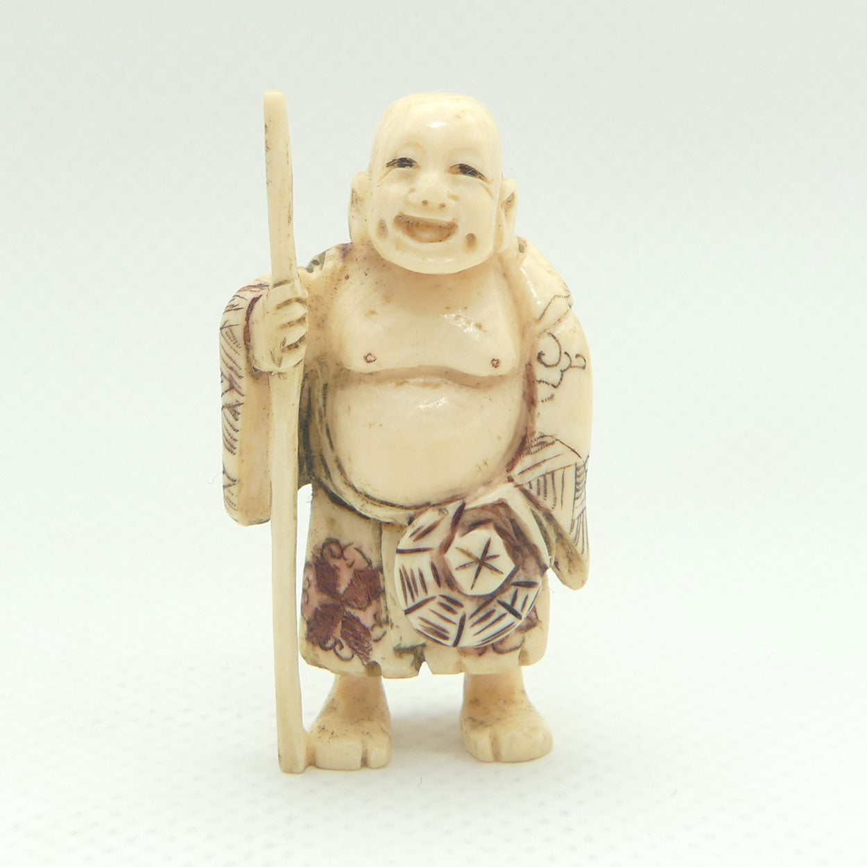 Japanese Carved Ivory Netsuke | Hotei with Staff | signed