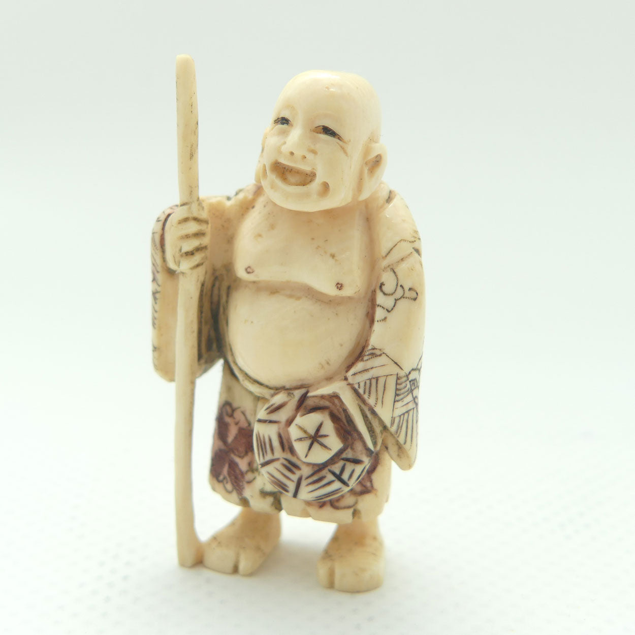 Japanese Carved Ivory Netsuke | Hotei with Staff | signed